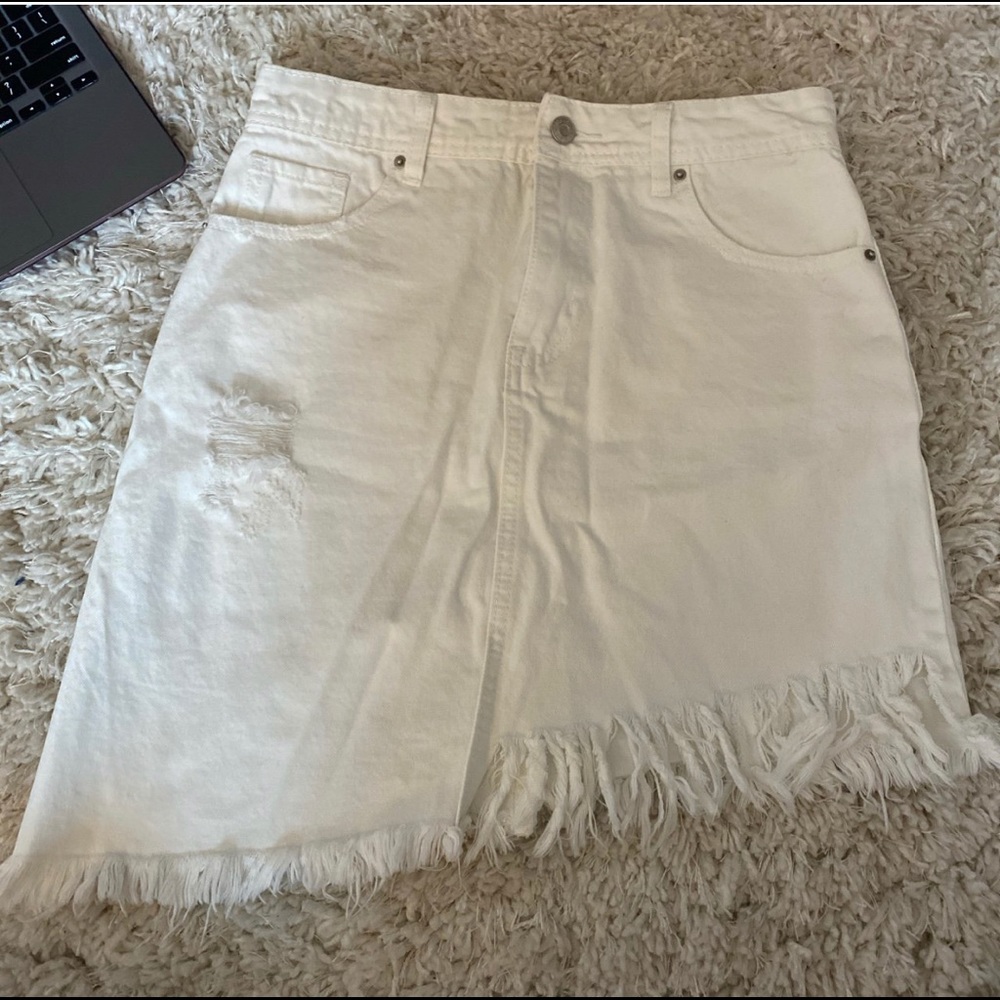 Slanted denim skirt